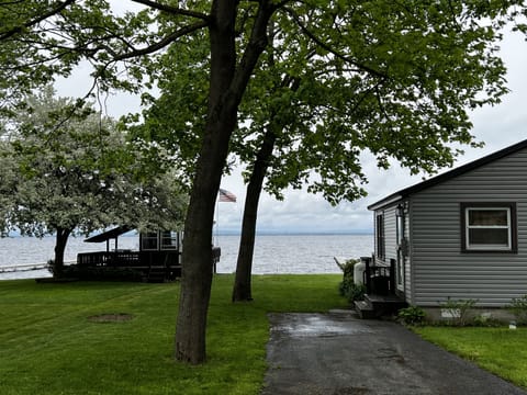 Gazebo left, Cardinal Cottage right. Space for 2 cars and small boat trailer