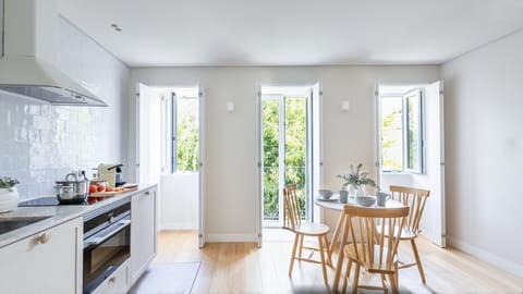 Design Apartment, 1 Bedroom, Balcony, City View (2) | Living area | 32-inch flat-screen TV with cable channels, TV