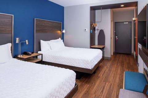 Desk, laptop workspace, blackout drapes, iron/ironing board