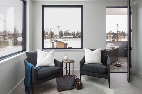 Primary bedroom - chairs have views of Glory Teton