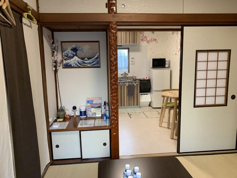 Two-Bedroom Apartment | Living area | 24-inch flat-screen TV with digital channels, toys