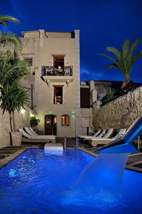 Outdoor pool, open 9:00 AM to 6:00 PM, sun loungers