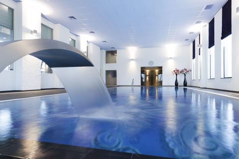 Indoor pool, open 7:00 AM to 11:00 PM, sun loungers