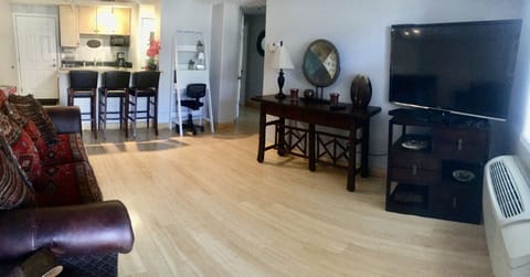 What a beautiful living room! Enough space for the queen air mattress.