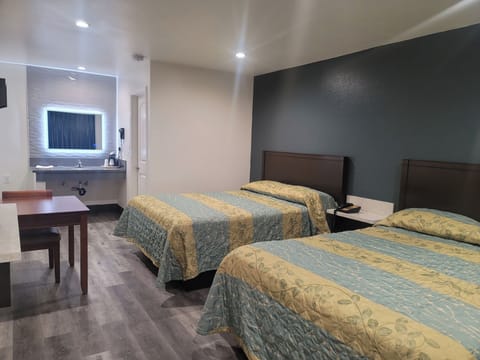 Standard Room, 2 Double Beds | Desk, iron/ironing board, free rollaway beds, free WiFi