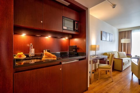 Fridge, microwave, stovetop, coffee/tea maker