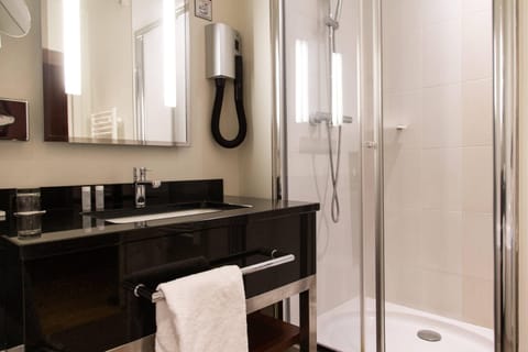 Eco-friendly toiletries, hair dryer, towels