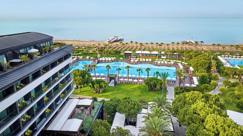 Private beach, free beach shuttle, sun loungers, beach umbrellas
