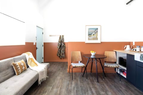 Family Suite | Living area | 55-inch Smart TV with digital channels, TV, Netflix