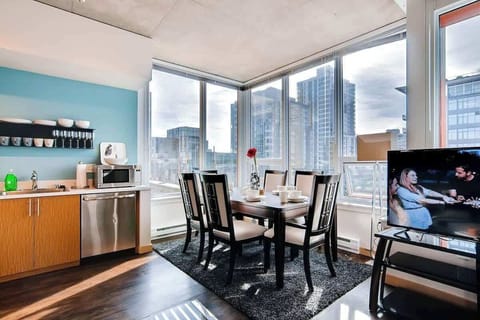 Walk in and impress friends and family with floor to ceiling views of Seattle, a separate dining area, beautiful decor, an open living space, and much more.