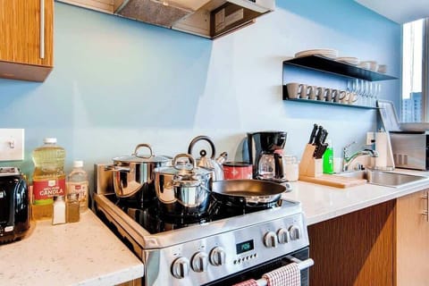 Full size kitchen area with appliances, cookware, dinnerware, utensils, Seattle Coffee, and more more.