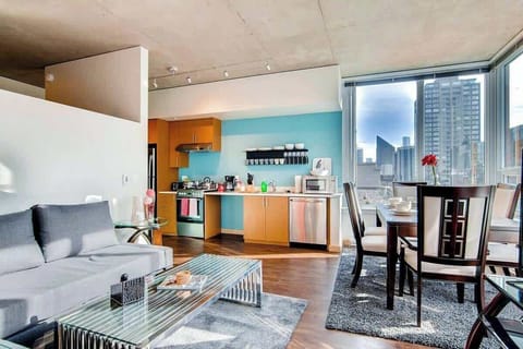 Walk in and impress friends and family with floor to ceiling views of Seattle, a separate dining area, beautiful decor, an open living space, and much more.