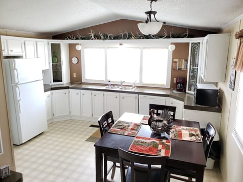Spacious kitchen with a newly installed dishwasher and everything else needed.