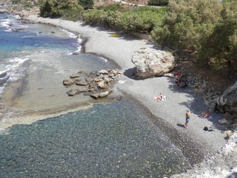 On the beach, black sand