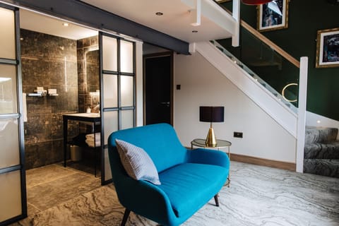 Luxury Suite | Living area | Smart TV, iPod dock, MP3 dock