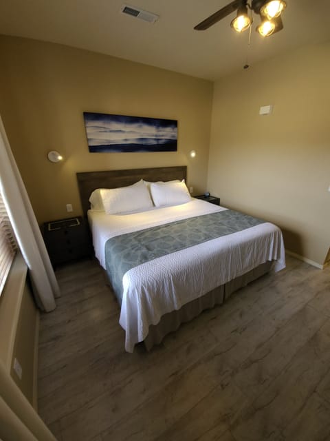 King size bed in bedroom 
