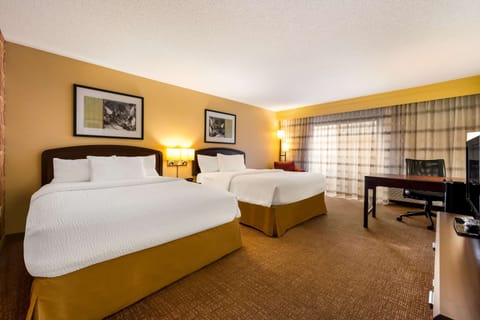 Premium bedding, individually decorated, individually furnished, desk