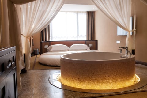 Premium bedding, memory foam beds, minibar, desk