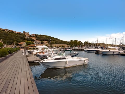 Water, Boat, Sky, Watercraft, Cloud, Vehicle, Lake, Tree, Bank, Building