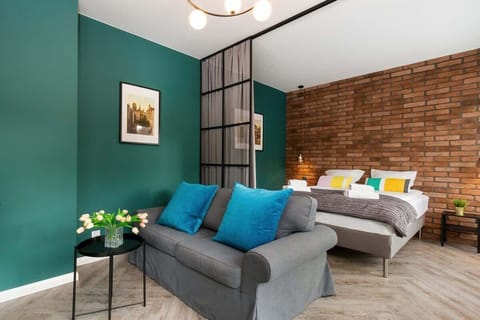 Living room with sofa, coffee table and tv