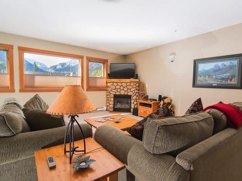 Top up, bottom down blinds frame the mountain views from the living room