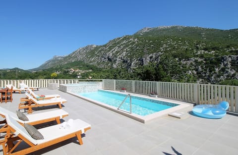 Villa Remušić with 24sqm pool, whirlpool, playground and BBQ