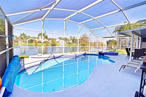 Heated pool with brand new in ground hot tub with waterfall feature