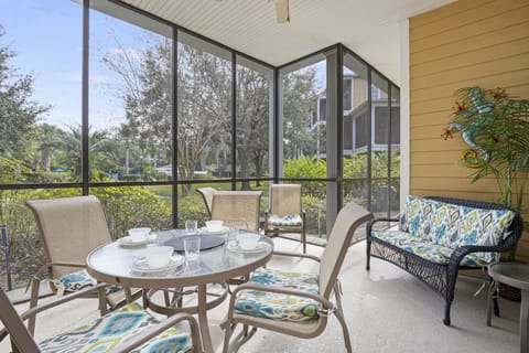 The oversized, screened lanai - 6 chairs can easily fit around a large table