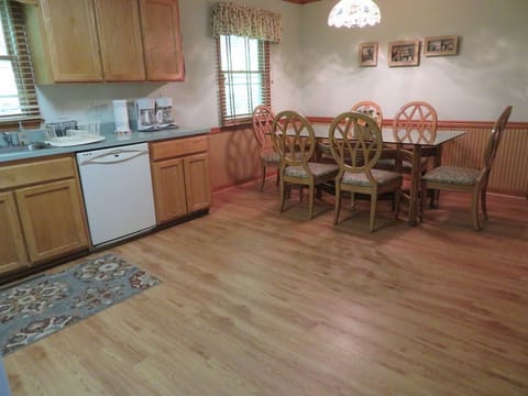 Large kitchen has seated dining for 8 people.