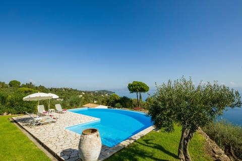 Private swimming pool and views towards Corfu Town and the Greek mainland.