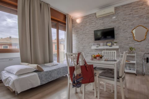 Family Studio | Premium bedding, down comforters, iron/ironing board, free WiFi