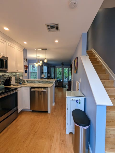 Open the front door to a bright spacious living space. 