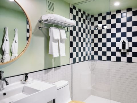 Shower, rainfall showerhead, designer toiletries, hair dryer