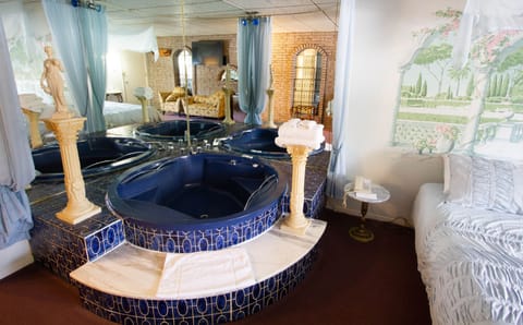 Romantic Studio, 1 King Bed, 2 Bathrooms | Down comforters, Select Comfort beds, individually decorated