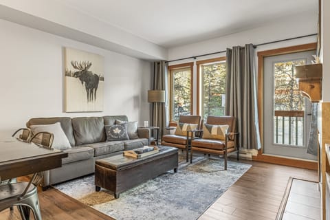 Luxury leather European Sofabed w/ stylish seating in open-concept Living Room. 