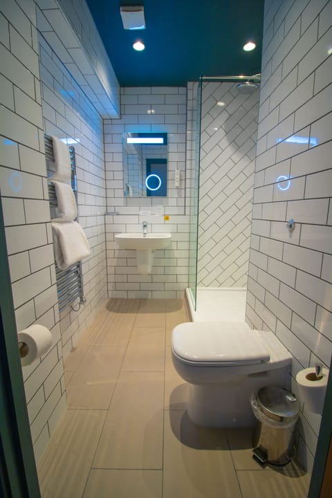 Premium bedding, desk, blackout drapes, iron/ironing board