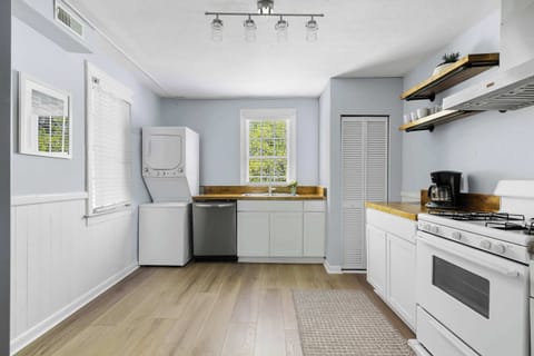 Upstairs kitchen with needed cooking supplies + washer/dryer 