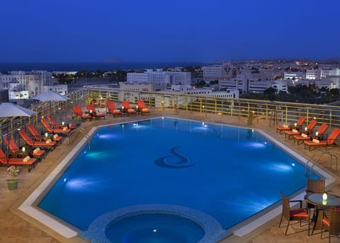 Outdoor pool, open 8:00 AM to 8:00 PM, pool umbrellas, sun loungers