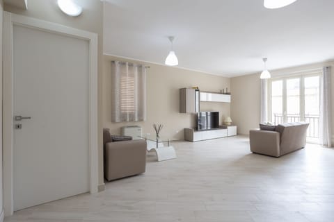 Exclusive Condo | Living area | 55-inch Smart TV with cable channels, Netflix, streaming services