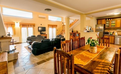 Dining area where comfortable can stay 8 people.