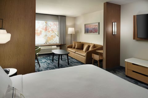 Desk, laptop workspace, blackout drapes, iron/ironing board