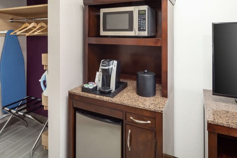 Desk, laptop workspace, blackout drapes, iron/ironing board