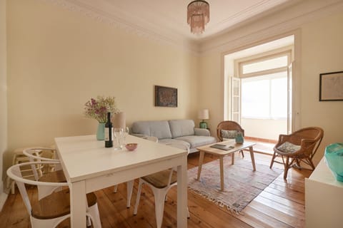 Apartment, 4 Bedrooms | Living room | Flat-screen TV