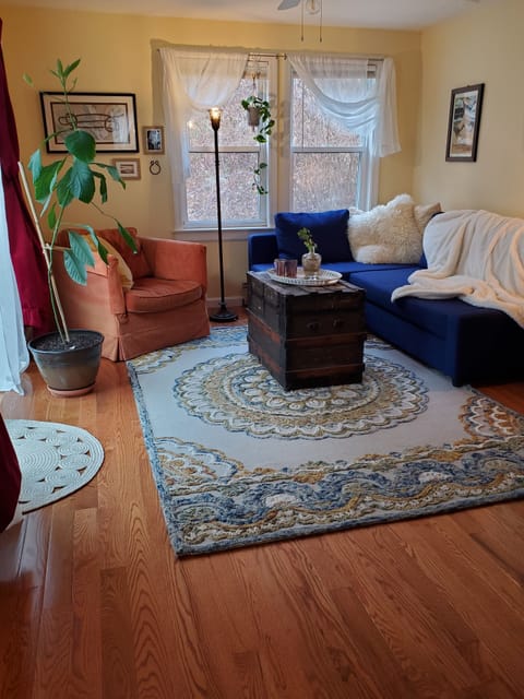 Living room with slider to the secluded back deck