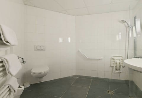 Shower, eco-friendly toiletries, hair dryer, towels