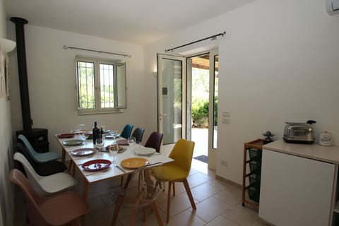 Dining inside the villa for up to 10 people.