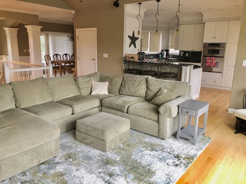 Living area open to kitchen and dining