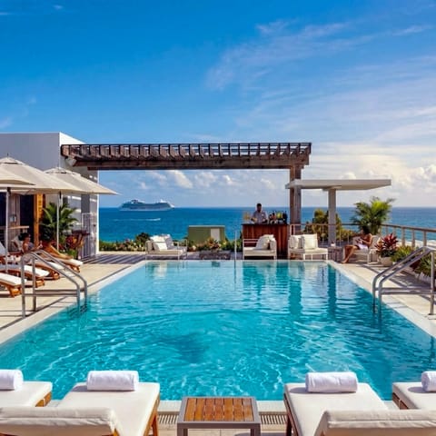 2 outdoor pools, pool umbrellas, sun loungers