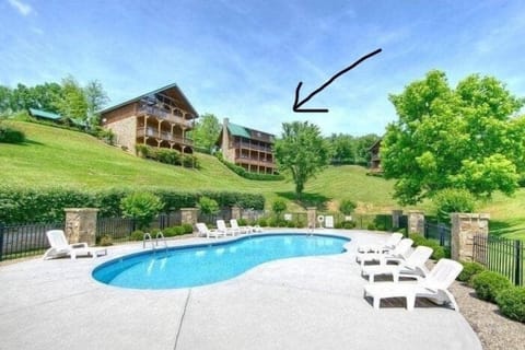 Arrow is point at Easy Breezy!  Great view of the pool from the back deck!