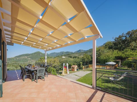 Plant, Property, Sky, Shade, Building, Architecture, Cottage, Outdoor Furniture, Tree, Real Estate